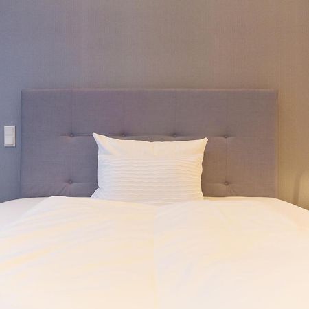 Parkhotel Fritz Am Brunnen Швельм Номер фото